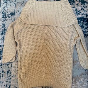 Oversized, off- the shoulder UmGee sweater
